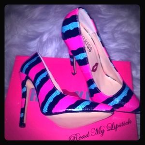 Super Adorable Faux Snakeskin Pumps.